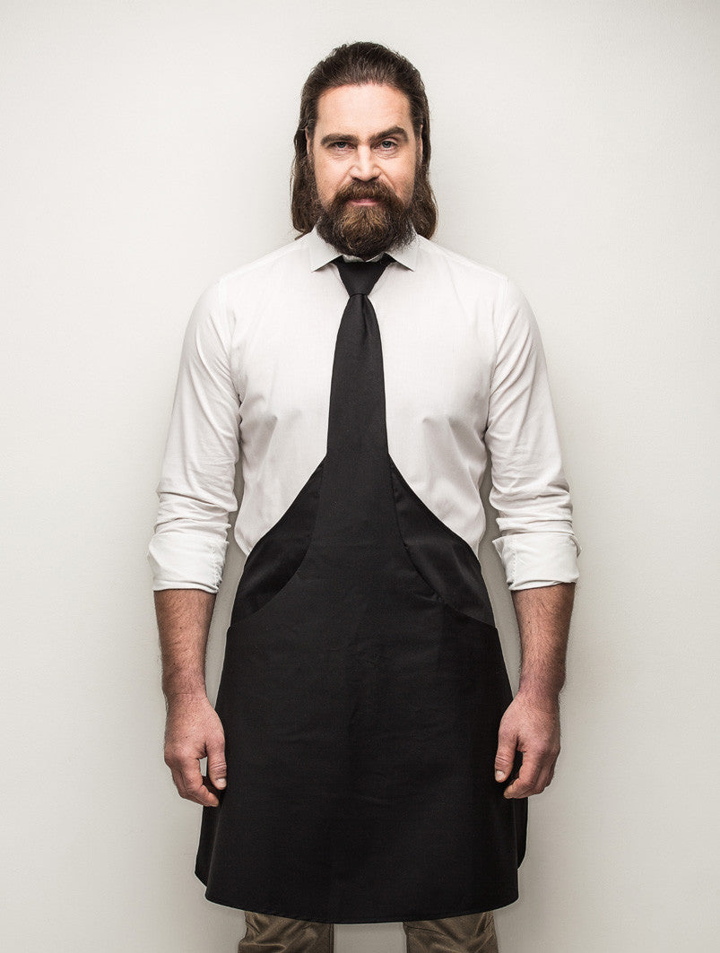 black tie apron bearded handsome man standing